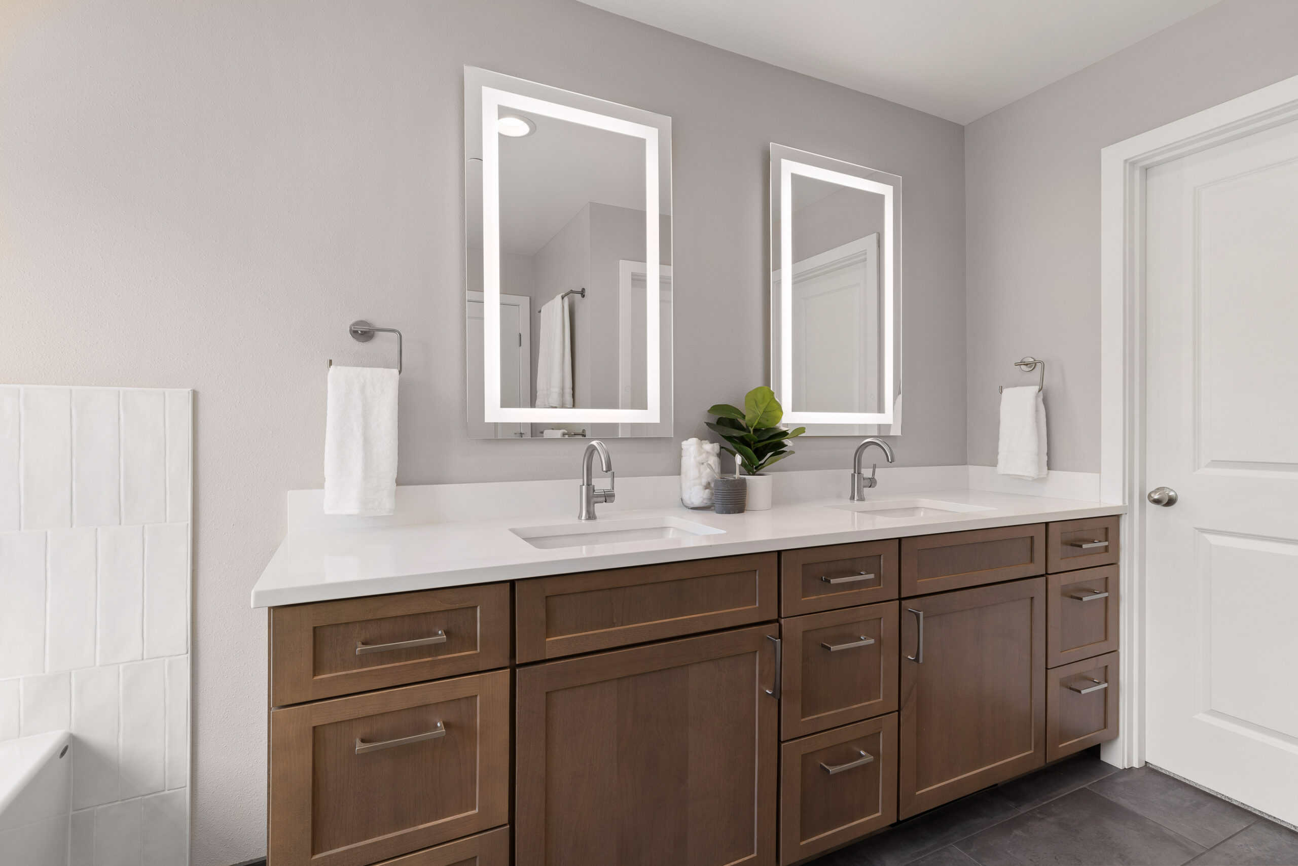 remodeled modern primary bathroom