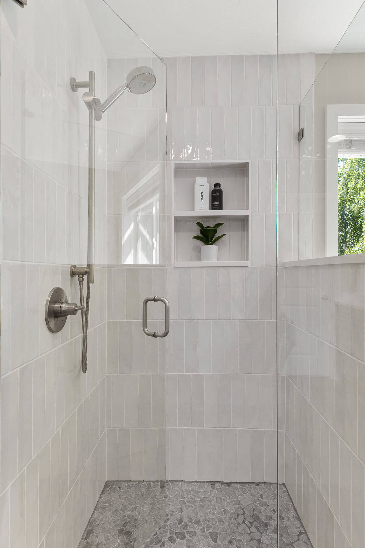 remodeled modern primary bathroom