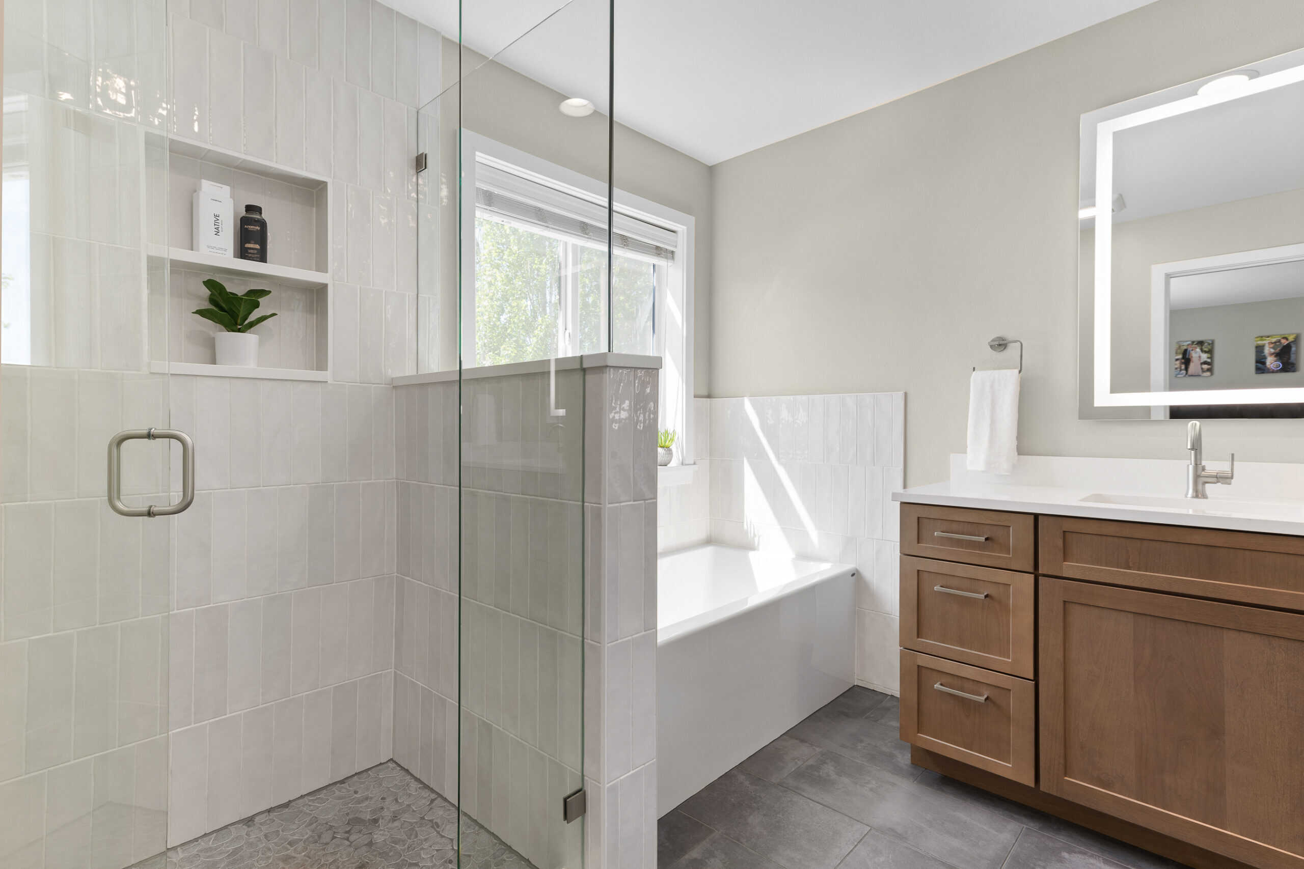 remodeled modern primary bathroom