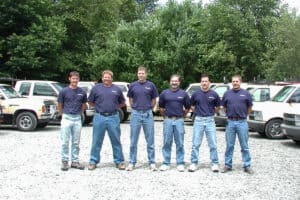 Our growing team with trucks